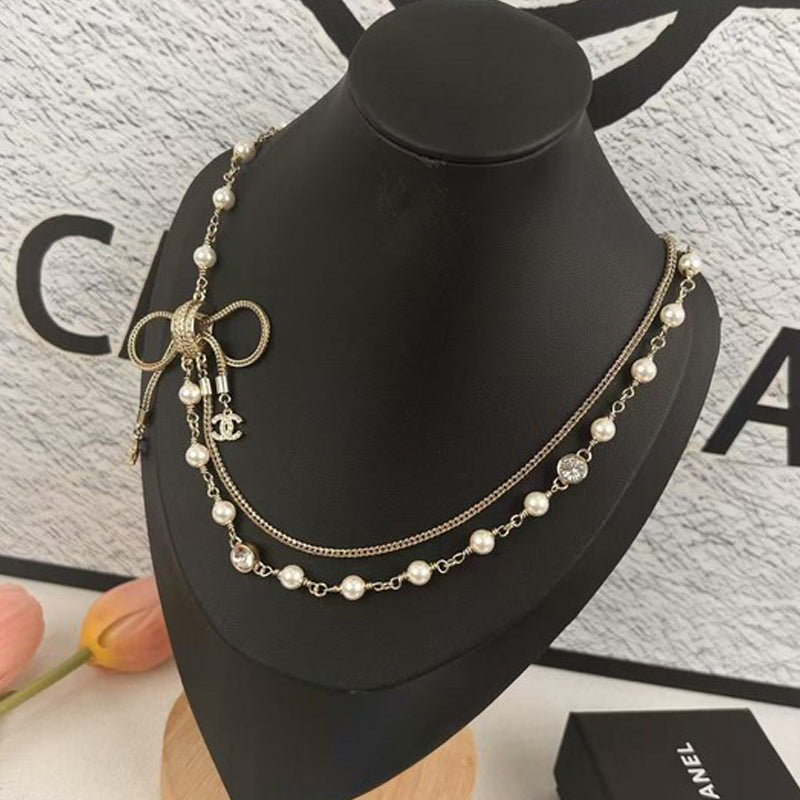 18K  Chanel Bow Tie Pearl Necklace